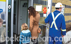 Lady & man enter store location to purchase Glass Security Film products Devon.